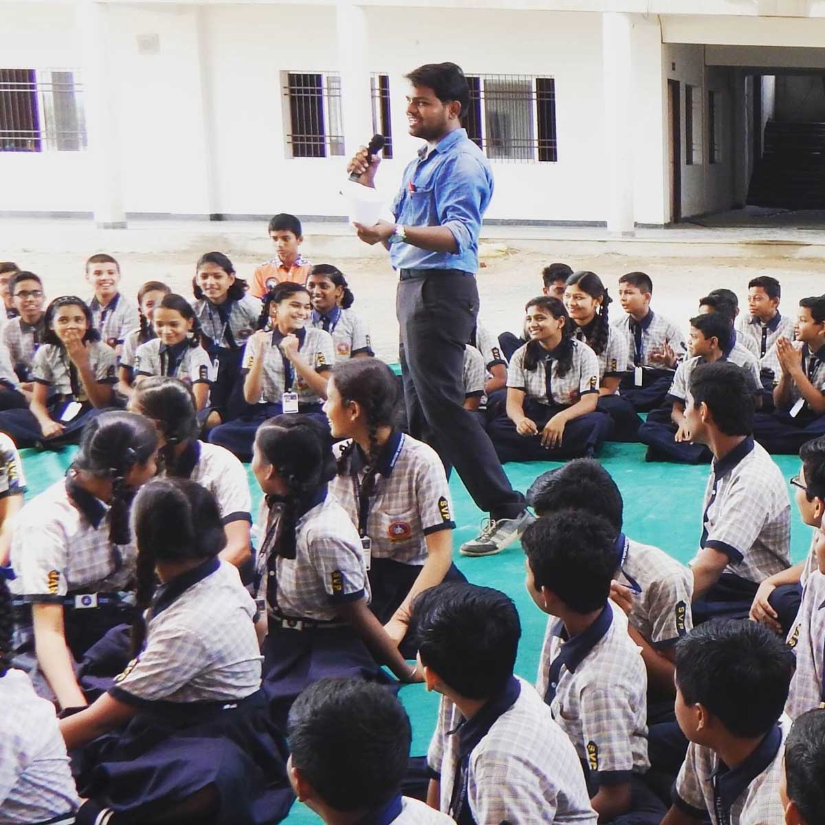 rakesh teaching students class school